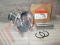 Поршень двигателя (ISBe,ISDe) V=4.5,6.7 {+0.50} E-4 в сборе {поршень,палец,кольца поршневые,кольца с "Аналог" (поршнекомплект)
