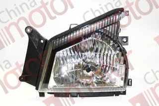 Фара ISUZU NKR55,NQR71,NQR75 левая (без ламп) (мех. корректор) "CM"