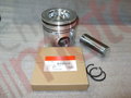 Поршень двигателя (ISBe,ISDe) V=4.5,6.7 {+0.50} E-4 в сборе (поршень,палец,кольца поршневые,кольца стопорные) "Аналог"